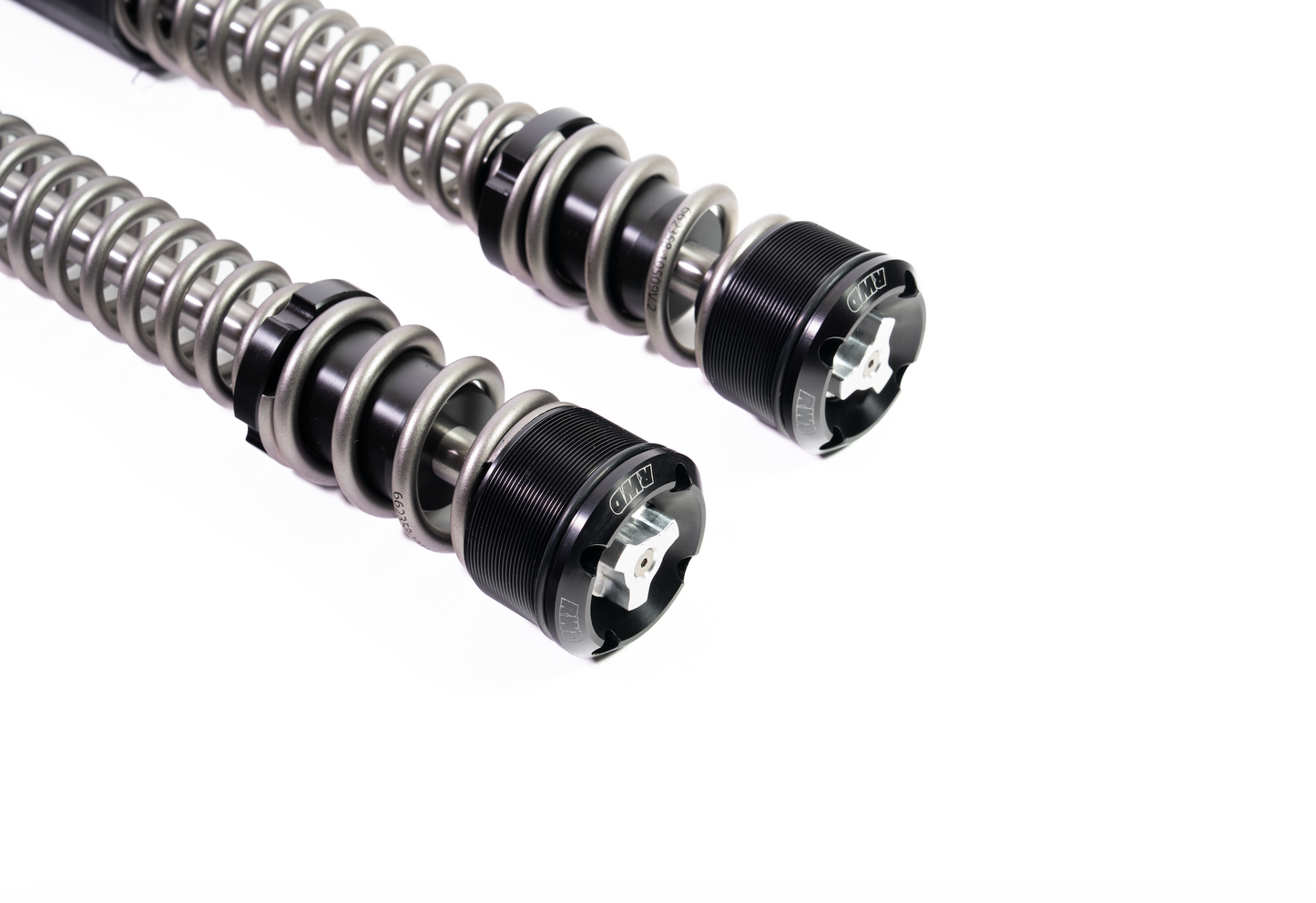 Two RWD V-Twin motorcycle fork springs with black caps and silver adjustment knobs, set against a white background.