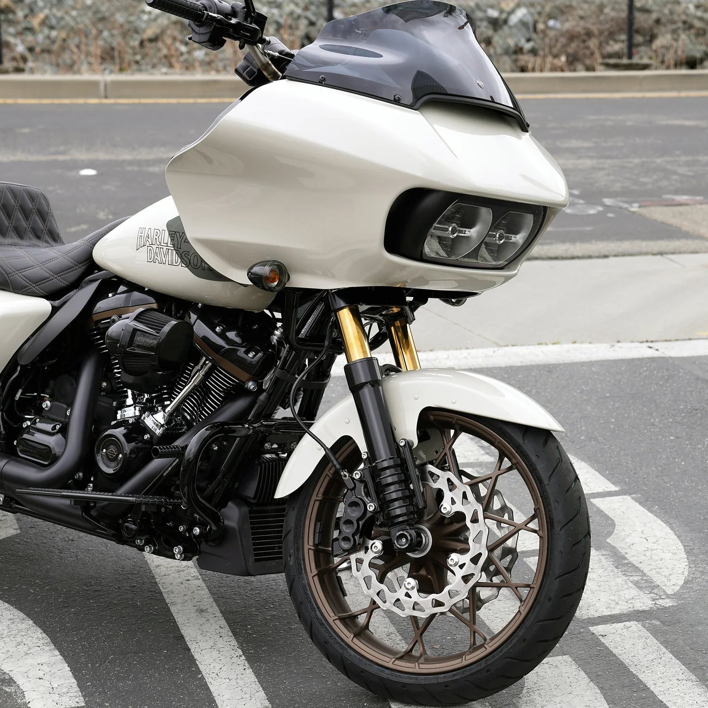 Gold and black suspension system from RWD V-Twin installed on a custom Harley